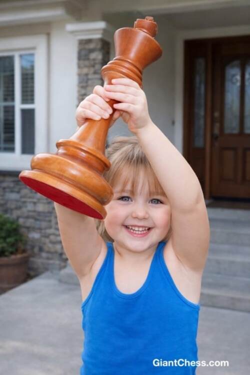 Giant teak chess set photo