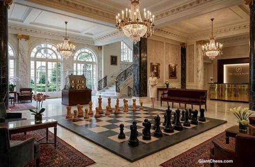 Giant teak chess set photo