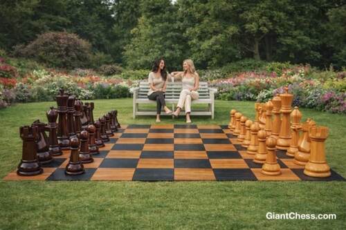 Giant teak chess set photo
