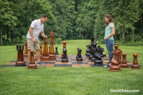 Giant teak chess set photo