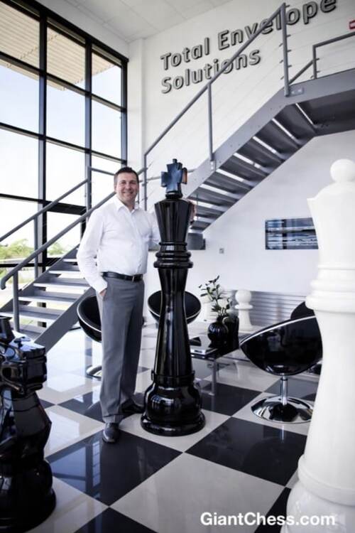 Giant teak chess set photo