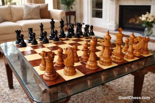 Giant teak chess set photo